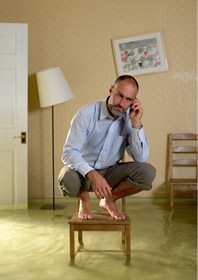 Man in flooded houes